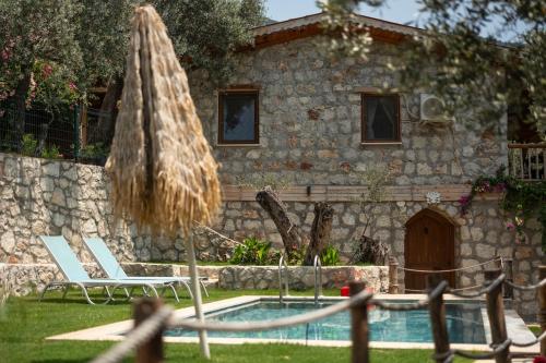 Stone House with Pool Among Olive Trees in Kabak — 4-Star Luxury Hotel in Fethiye, Turkey