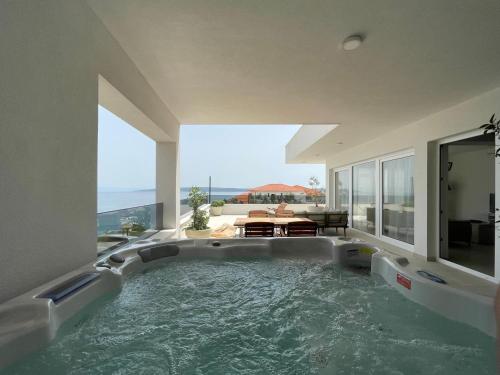 Exclusive 2 Bedroom Seafront Suite with jacuzzi — 4-Star Luxury Hotel in Jelsa, Croatia