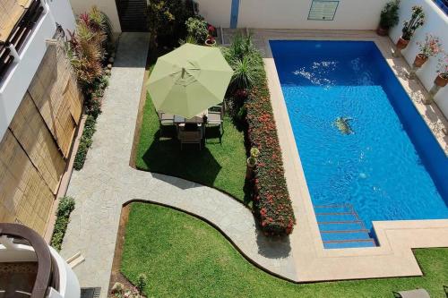 Apartment Tortugas rooms with AC and great pool at 5 min from Carrizalillo beach and Benito Juarez Bulevard — 4-Star Luxury Hotel in Puerto Escondido, Mexico