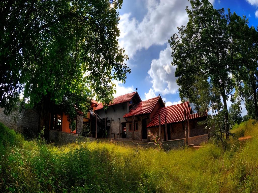 Pugdundee safaris Kanha Earth Lodge — 4-Star Luxury Hotel in Mandla, India
