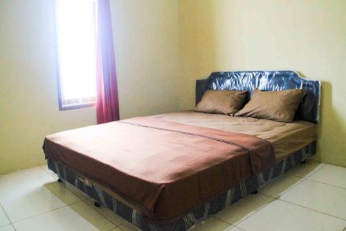 Puri Karomah Syariah Redpartner — Lamongan