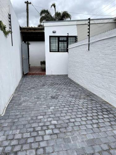 Centrally located modern 2 bedroom home & parking