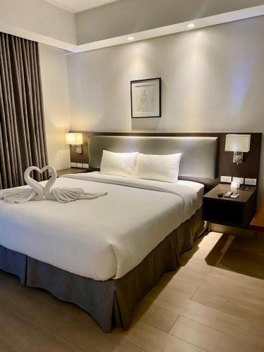 Aura Luxe Stays at BCCT — 4-Star Luxury Hotel in Manila, Philippines