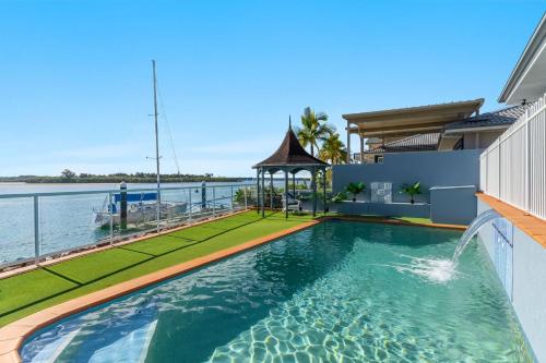 Salty Dayz Designer Waterfront Holiday Yamba in Yamba, Australia