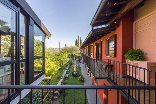 Omas Haus by Ilaria Homes — 4-Star Luxury Hotel in Toscolano Maderno, Italy
