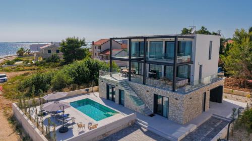 Seafront Villa Aurea with pool and seaview — 4-Star Luxury Hotel in Privlaka, Croatia