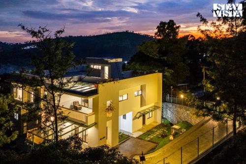 StayVista at Villa Aruvi with Bonfire Lawn — 4-Star Luxury Hotel in Ooty, India
