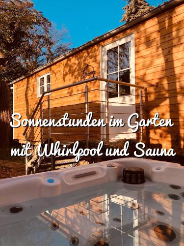 Zirkuswagen mit Outdoor Whirlpool und Garten — hotel in Petershagen