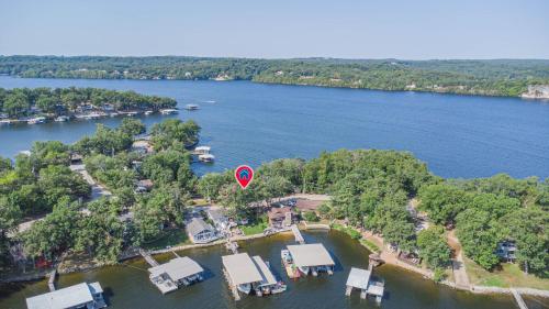 Beach Vacation Homes water toys relaxing boat slip and dock — 4-Star Luxury Hotel in Lake Ozark, United States
