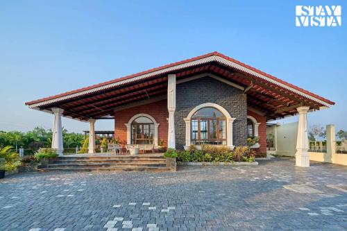 StayVista at Golden Ridge Pool BBQ Bonfire — 4-Star Luxury Hotel in Jaisingpur, India