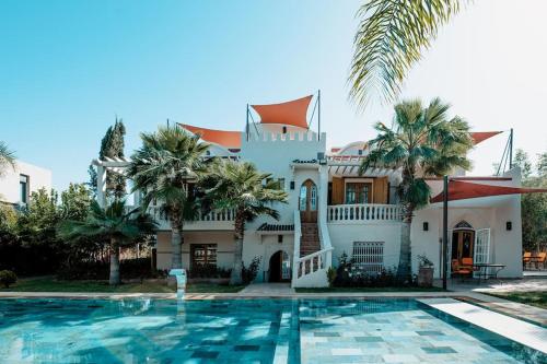 La Villa d'Oz pour 12 personnes Golf Amelkis — 4-Star Luxury Hotel in Marrakesh, Morocco
