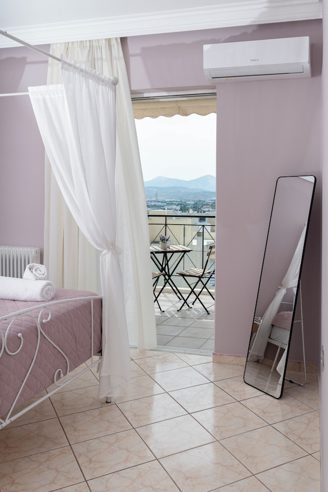 Terminal Square Suites — 4-Star Luxury Hotel in Markopoulo, Greece
