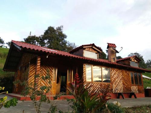 CASA LA KOCHA Cabin Hostal en la Laguna de la Cocha — 4-Star Luxury Hotel in Pasto, Colombia