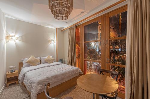 Palm Tbilisi Boutique Hotel — 4-Star Luxury Hotel in Tbilisi, Georgia