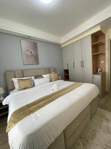 Elegant cityscape residences with private parking space heated swimming pool children parking space and proximity to major shopping malls