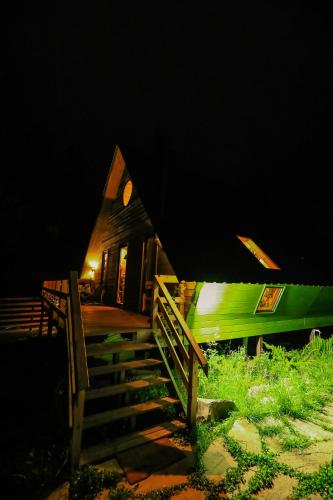 Wooden cottage green house in Bakuriani