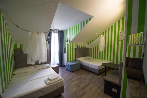 Amazing Attic Max 10 People with Parking & Wifi Near To 3 Tram Lines And To the Metro Well Connected To Airports And To the Train Station — 4-Star Luxury Hotel in Milan, Italy