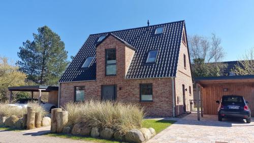 Tohuus Whg 01 Uennen — 4-Star Luxury Hotel in Sankt Peter-Ording, Germany