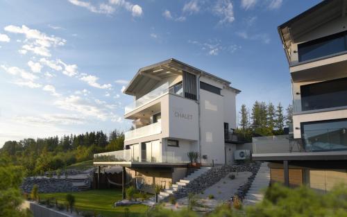 Petit Chalet 69 Am Hainer See — 4-Star Luxury Hotel in Neukieritzsch, Germany