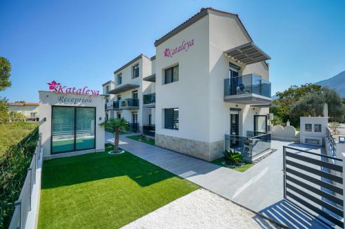 Kataleya Poolside Suites - carbon neutral hotel in Unknown City