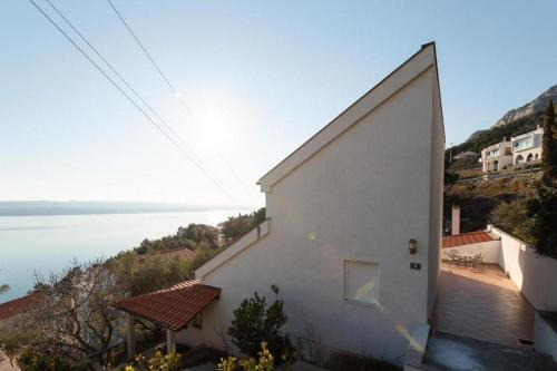 Family friendly apartments with swimming pool Marusici Omis 21377 — 4-Star Luxury Hotel in Omis, Croatia