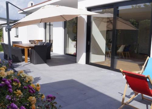 Wellenklang Luxusbungalow mit Rosengarten — 4-Star Luxury Hotel in Wangerooge, Germany