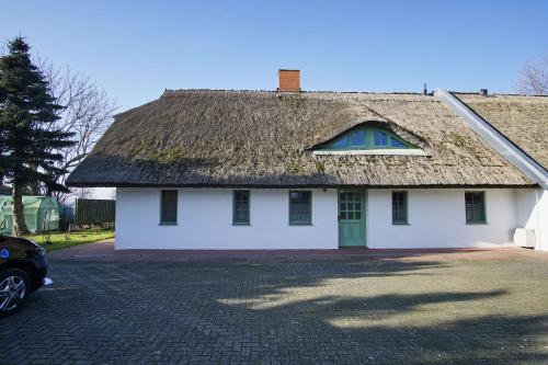 Hafenhäuser Wiek Ferienwohnung 01 — 4-Star Luxury Hotel in Wiek, Germany