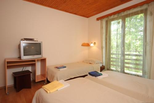 Rooms with a parking space Veli Brgud Opatija 7840 - last minute hotel in Unknown City