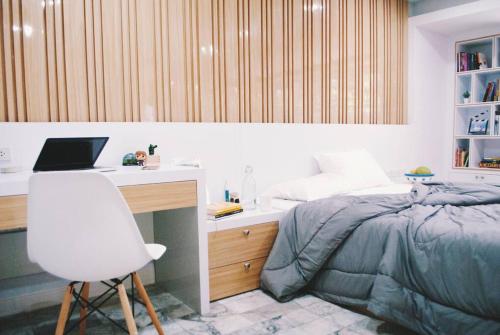 Double Studio Private Bath Shared Kitchen with Local Family by Pillows & Purrs
