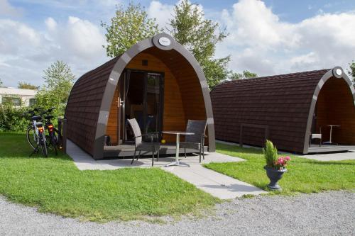 Kleine Nordseewelle ohne Hund - carbon neutral hotel in Norden