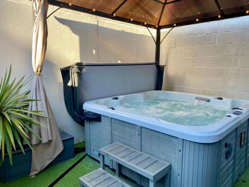 Sandcastles moments from the beach hot tub in Weymouth, United Kingdom