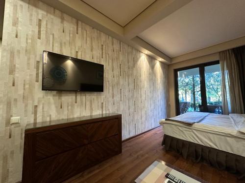 Seaside Apartment with a Private Garden