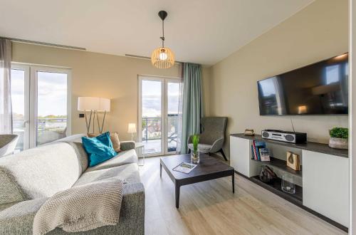 Sommerperle 5 Sterne Ferienwohnung im Strandhaus Stil mit Wellnessbereich und Ostseeblick — 4-Star Luxury Hotel in Wustrow, Germany