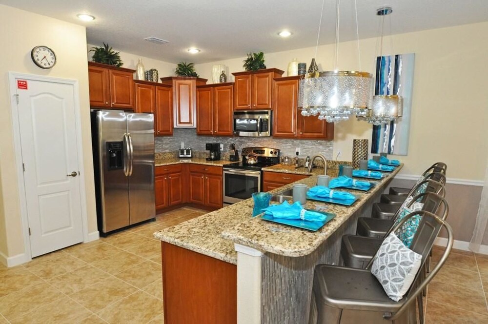 Fabulous 8 Bed 5 Bath Pool Home in Championsgate Golf Resort - photo 11