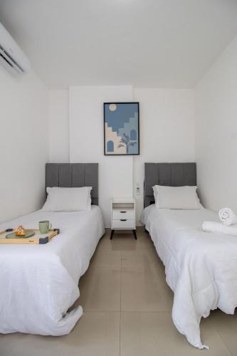 ABM22 Frente Mar 3 Dorm Climatizados Garagem