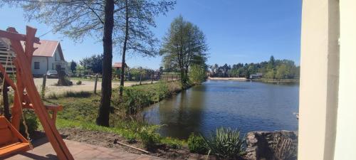 Agrowczasy Nad Stawem Plus strefa jacuzzi przy domu z jedną sypialnią in Busko-Zdroj, Poland