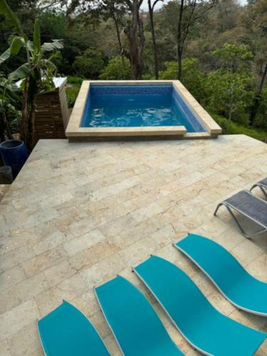 Luxury Oasis with 2 King Suites pool incredible Ocean views beach just a 350 yard walk in Unknown City, Honduras