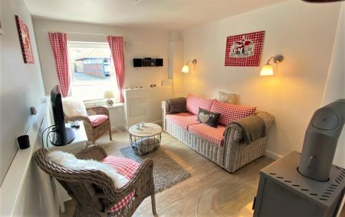 Fischers meerZeit kleines Fischerhaus Kaminofen Garten in Heiligenhafen, Germany