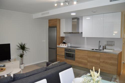Apartamenticos Plaza del Pilar I — 4-Star Luxury Hotel in Zaragoza, Spain