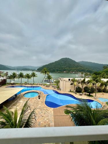 Quarto Hotel Porto Marina Mont Blanc Resort Mangaratiba Itacuruça Rj in Mangaratiba, Brasil