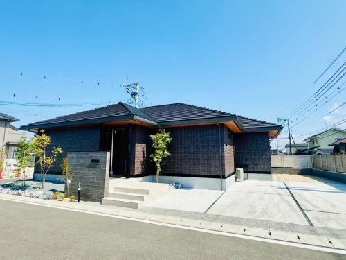 Akikawa Miyoshi 1 in Unknown City, Japan