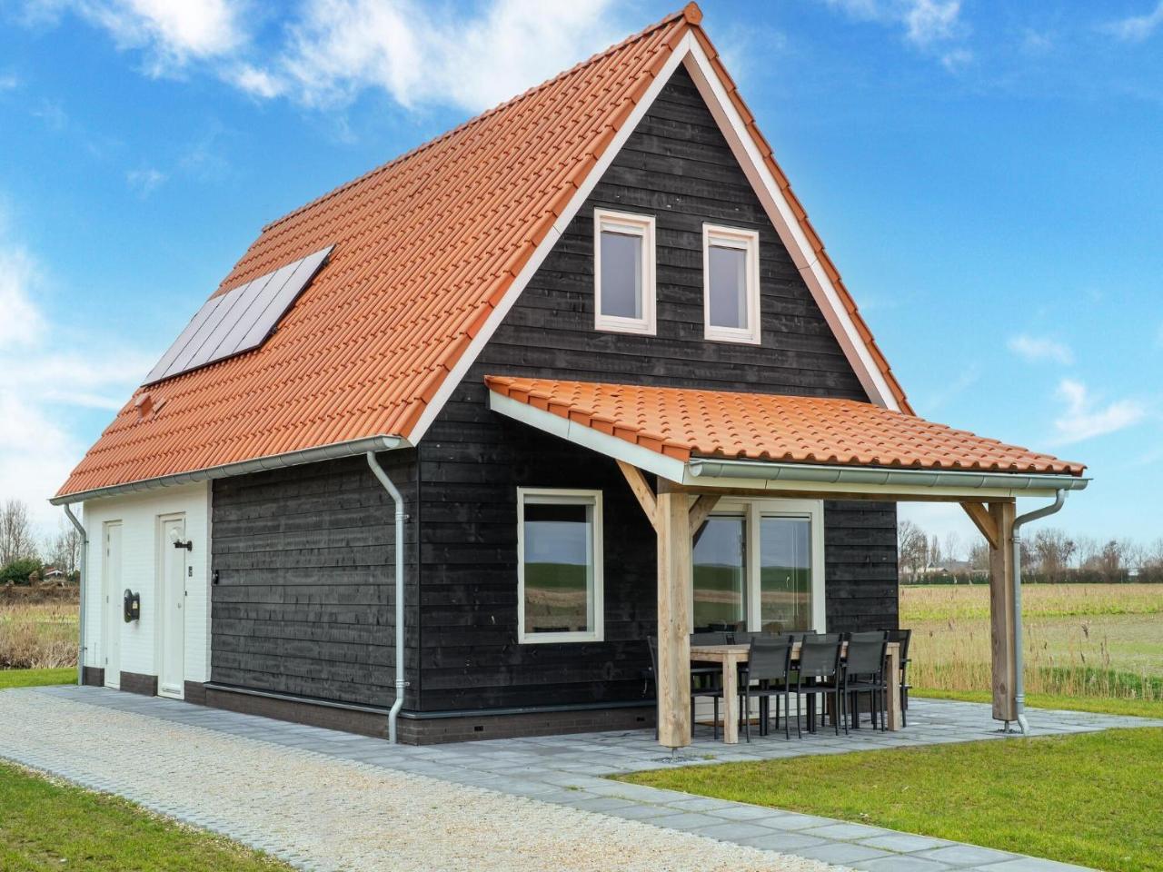 Luxury villa on the Eastern Scheldt with sauna and stunning views — 4-Star Luxury Hotel in Scherpenisse, Netherlands