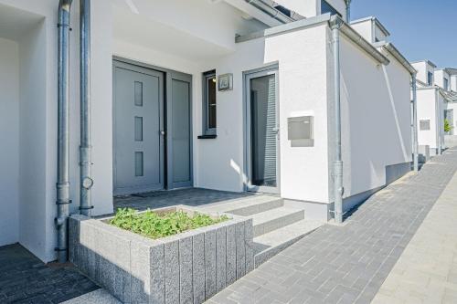 Bernsteinquartier 7c Ferienhaus mit 2 Schlafzimmer& Terrasse — 4-Star Luxury Hotel in Loddin, Germany