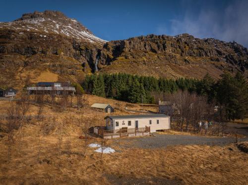 Home under a waterfall 7 mins from Glacier Lagoon