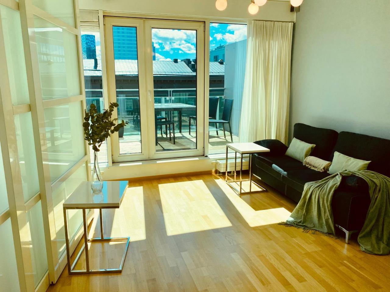 City Heart Apartment with a Sunny Rooftop Terrace