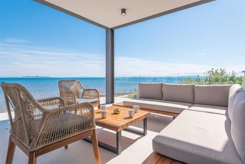 Villa Serena Luxury Seafront Escape with Pool — 4-Star Luxury Hotel in Privlaka, Croatia