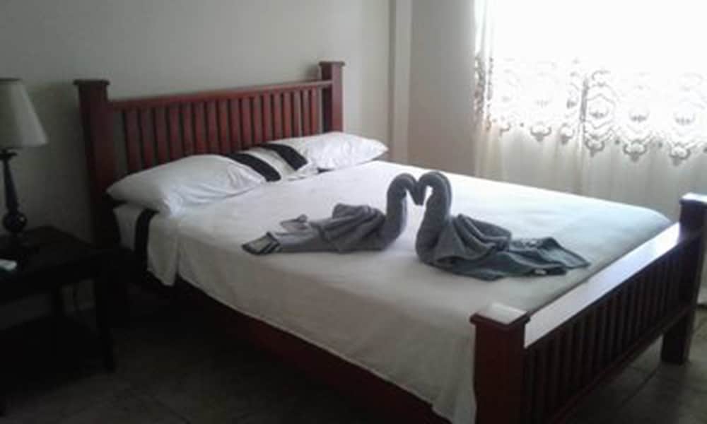 Relaxed Life Airport Plaza in Unknown City, Belize