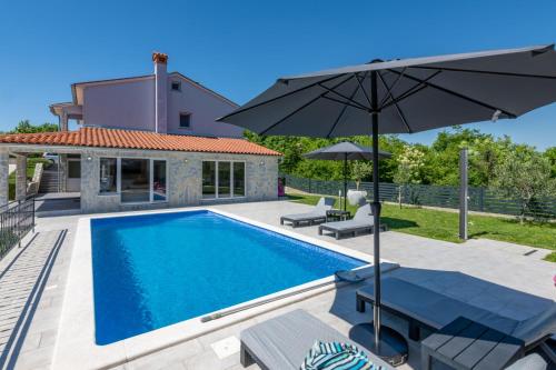 Villa Kalac a charming holiday pool oasis near the sea — 4-Star Luxury Hotel in Rasa, Croatia