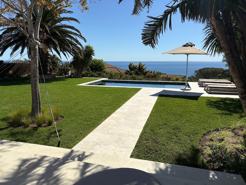 Relax in Style at This Stunning Villa in Camps Bay Cape Town