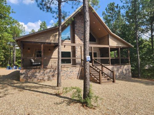 Peak A Boo Pines with Game Loft Hot Tub Fireplaces and More in Broken Bow, United States